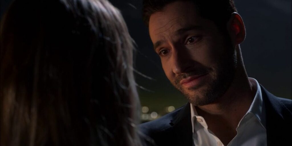 Lucifer looking at Chloe on balcony in Lucifer